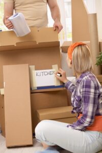 Couple packing for moving, local movers